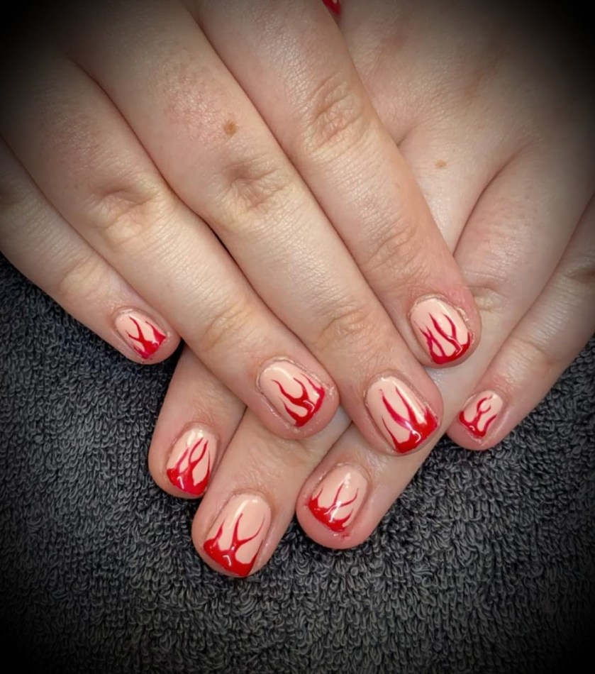 Gel polish with nail art of flames