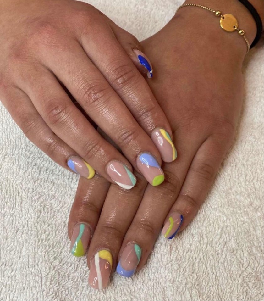 Acrylic nail extensions with abstract nail art